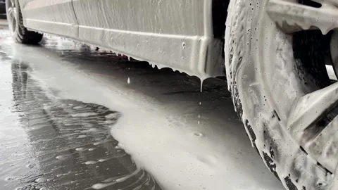 Foam Cleaning a White Car Stock Footage 299908229