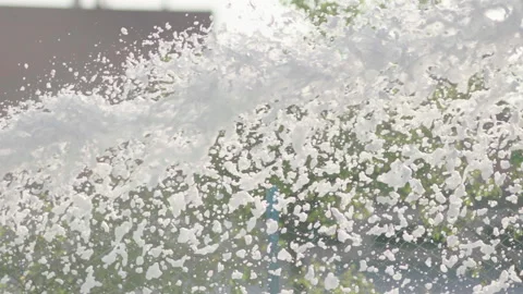 Foam flies out of the fire hose in a jet for extinguishing the fire. Stock Footage 240701101
