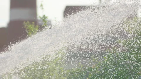 Foam flies out of the fire hose in a jet for extinguishing the fire. Stock Footage 240701677