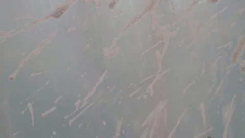 Foam flows down the glass Stock Footage 102111873