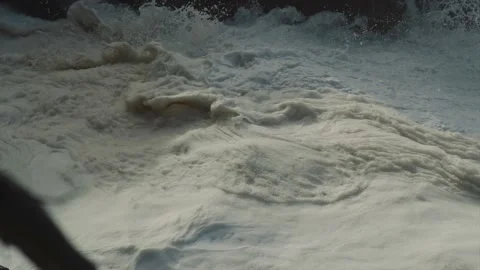 Foam forming on rough sea waves Stock Footage 168772913