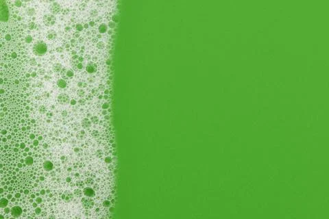 Foam on green background macro Stock Photos