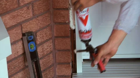 Foam Gun for professional insulation Stock Footage 133617477