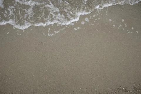 Foam Line on Smooth Beach Background Stock Photos
