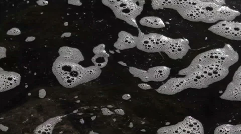 Foam moves on the water Stock Footage 48488712
