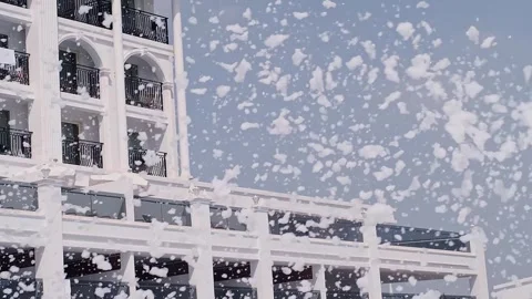 Foam party at the pool: epitome of resort fun. Ideal for hotel resorts, entertai 스톡 동영상 270084897