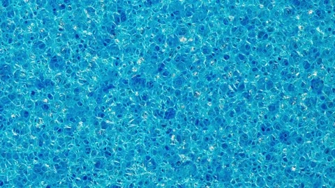 Foam rubber blue sponge, polygonal pores rotating 스톡 동영상 240656481