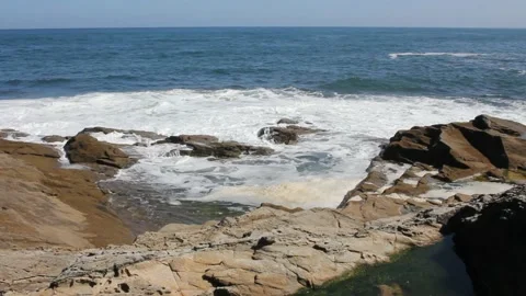 Foam from the sea in the rocks Stock Footage 232905908