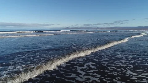 The foam of the surf on the beach. Stock-Footage 80242322