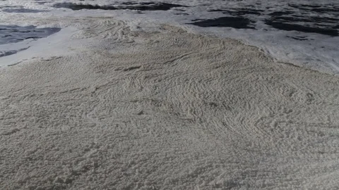 Foam on the surface of the river next to the hydroelectric station. Stock Footage 81467671