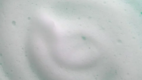 Foam texture backdrop on blue background. Liquid soap bubbles, Froth bubbles Stock Footage 279511167