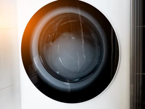 Foam in washing machine. Stock Photos