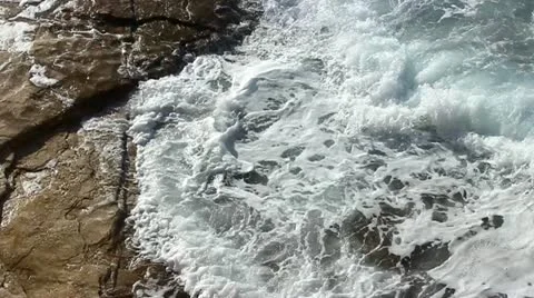 Foam, waves and coast Stock Footage 20643507