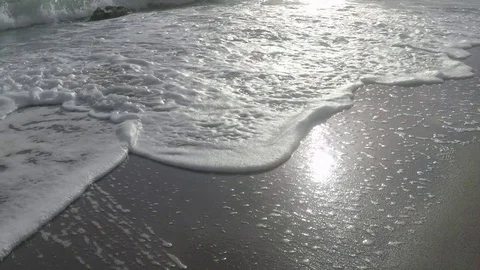 Foam of Waves and Sun Reflection - Slow Motion Stock Footage 75951737