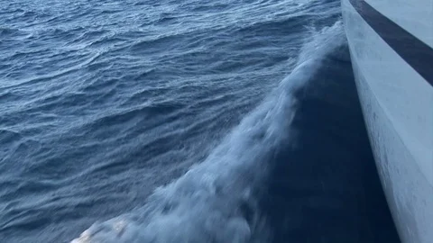 Foam, waves and water on camera during movement of yacht 動画素材 118801467