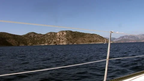 Foam, waves and water on camera during movement of yacht Видео 155150078