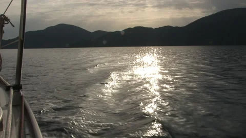 Foam, waves and water on camera during movement of yacht Stock Footage 155150253