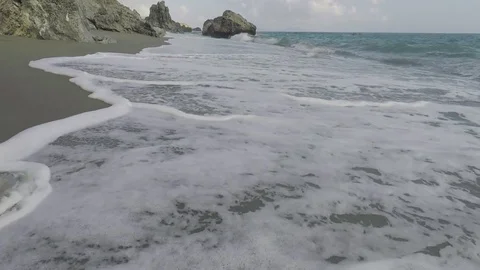 Foam of Waves in the Beach Stock Footage 75888849