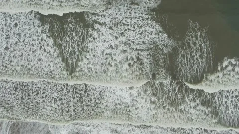 Foam waves go one by one on the surface of the sea Stock Footage 132183365