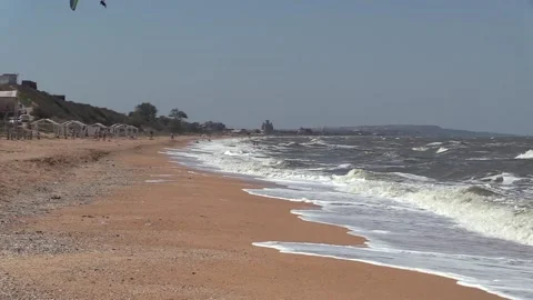 Foam waves run over the sea sand Stock Footage 145733408