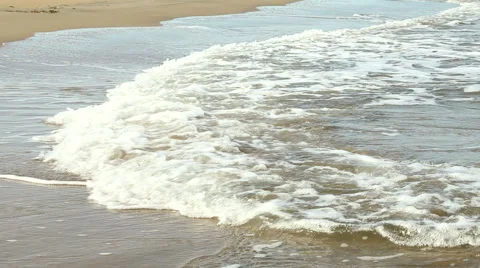 Foam waves on a sandy beach. Stock Footage 59943209