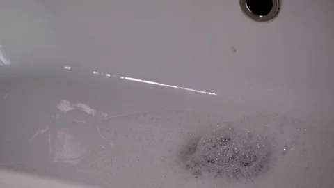 Foam on a white background Stock Footage 124632065