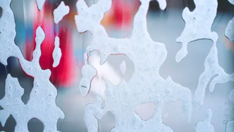 Foam Wiped Off Car Window During Car Wash  Abstract Soap Streak Close-Up Video stock 331839136