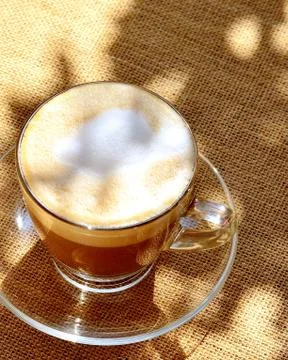 Foamed Coffee On Table From Above 写真素材