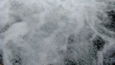 Foamed water from a waterfall Pattern of splashing waves Foam bubble from soap Stock Footage 116720433