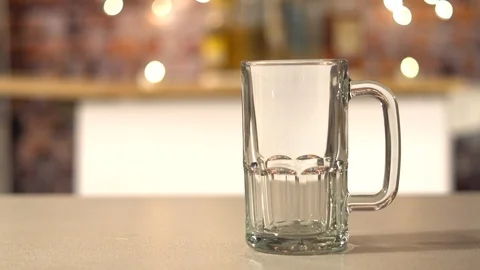Foaming amber beer in a mug Stock Footage 102683398