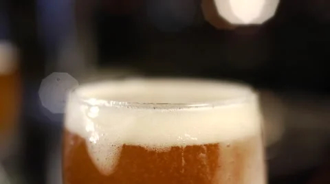 Foaming Beer Tilt Down Stock Footage 41069586