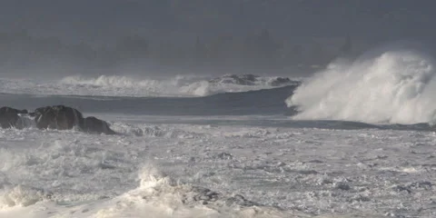 Foaming high waves churning through a rocky channel Stock Footage 59525480