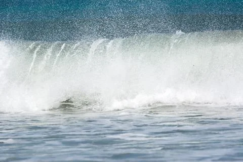 A foaming wave that breaks Stock Photos
