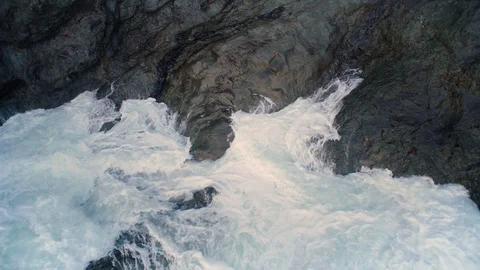 Foaming Wave Sea Erode to Reef Rock Stock Footage 128947763