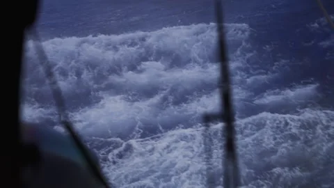 Foaming waves beside sailing ship in rough seas Vídeos de archivo 337951694