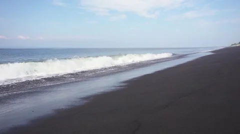 Foaming Waves on the Black Volcanic Beach. Slow Motion Stock Footage 67259371
