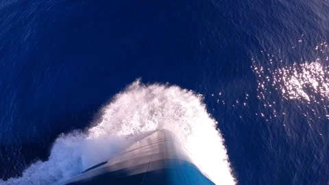 Foaming waves from bow of cruise ship cutting through waters of Southern Ocean 動画素材 335194830