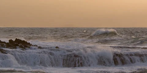 Foaming waves breaking over a rocky reef Stock Footage 59525791