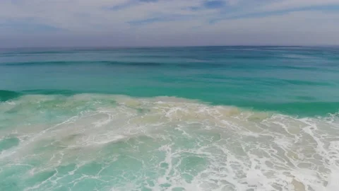 Foaming waves of bright blue ocean water on the shore of Dominican Republic, 4k Stock Footage 154250594