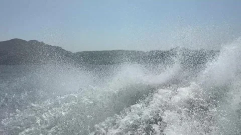 Foaming waves near the side of the ship. Close-up view of water splashing Stock Footage 336942697