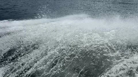 Foaming waves near the side of the ship. Close-up view of water splashing Stock Footage 337571304