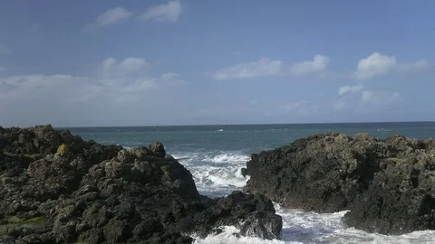 Foaming White Waves in Narrow Rocky Inlet - Slow Motion Stock Footage 73535869