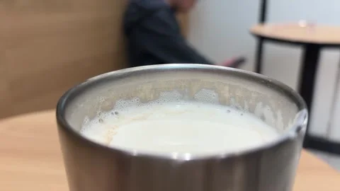 Foamy Milk Tea at a Modern Tea Shop, Close-Up 動画素材 333723376