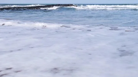 Foamy ocean waves breaking on sandy Runkerry Beach Vídeos de archivo 304992521