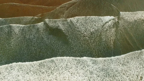 Foamy ocean waves rolling along sandy coastline in Costa Rica Stock Footage 344702269