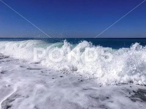 Foamy sea in the morning. Stock Photos