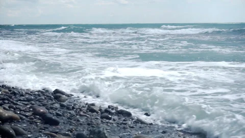 Foamy seawater, with raging waves. Stock Footage 255901150