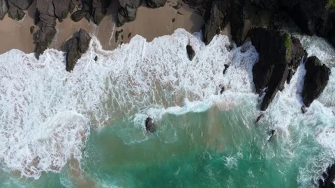 Foamy Surf and Rugged Cliffs Along Irish Coastline Stock Footage 336631131