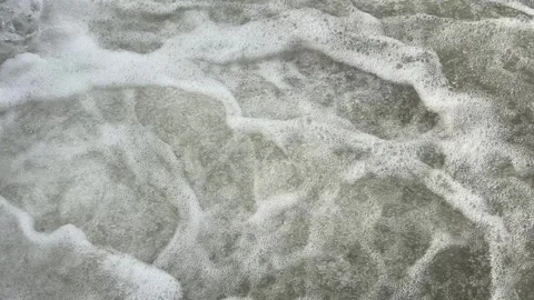 Foamy turbulent water surface in river stream outdoors, natural liquid motion Stock Footage 336960356