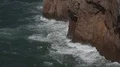 Foamy waves and sea breeze at the cliffs of Portugal coastline 4k or 4k+ Resolution